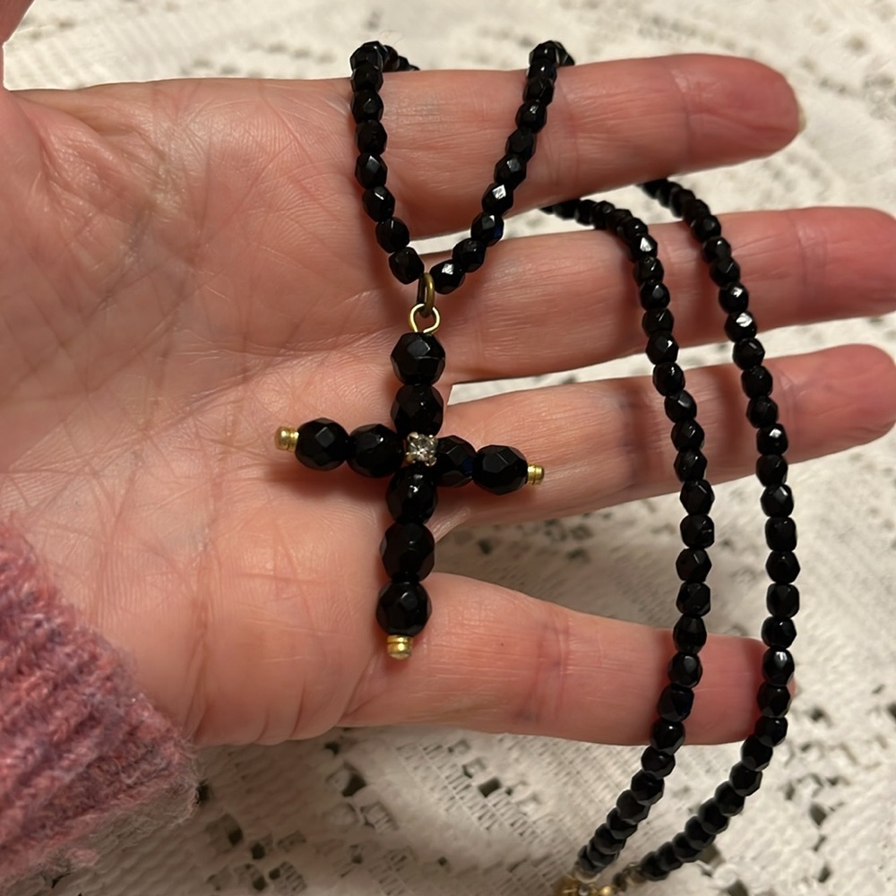 THE LIMITED black checkerboard cut glass beads with gold tone cross